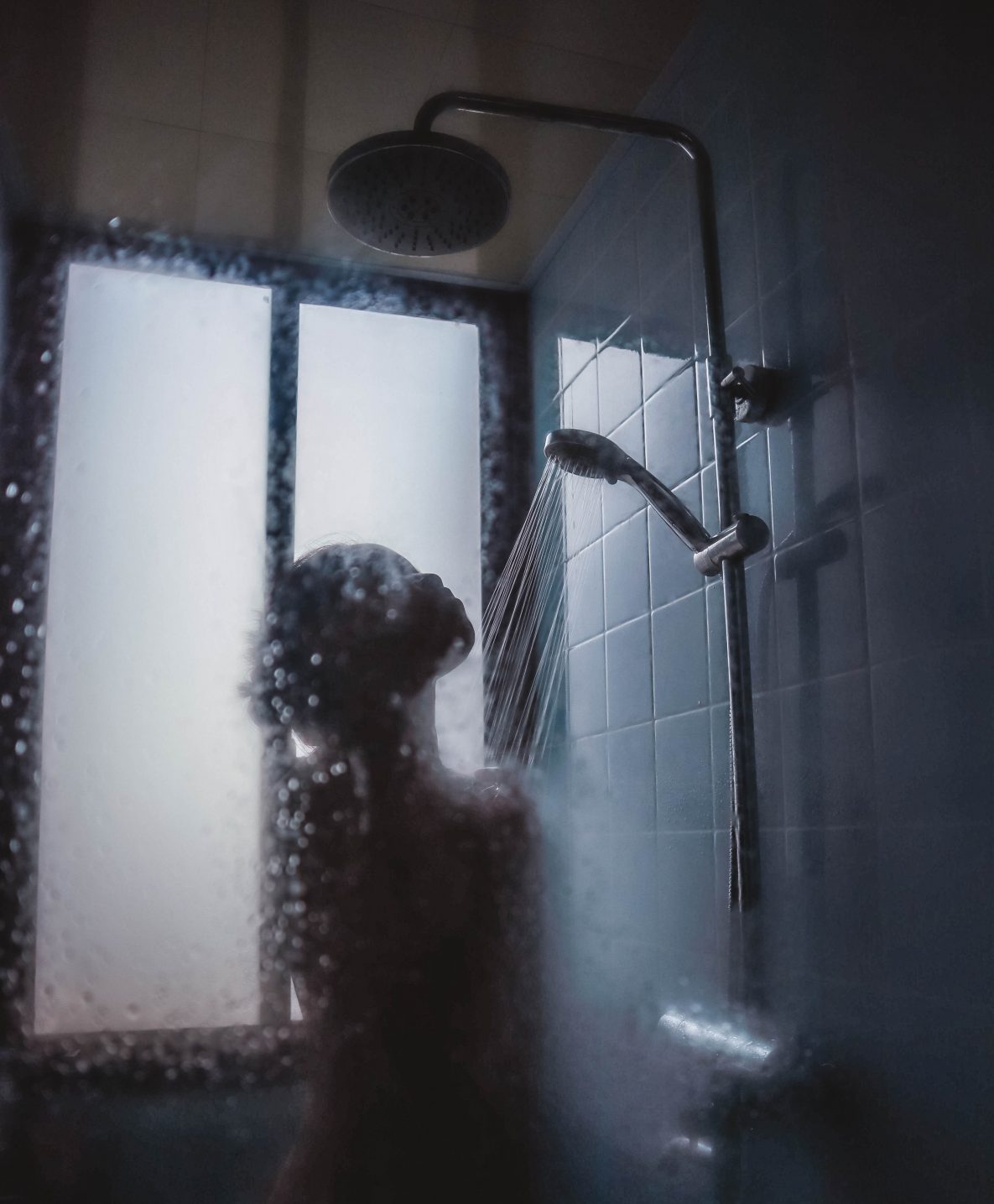 Naked girl taking a shower