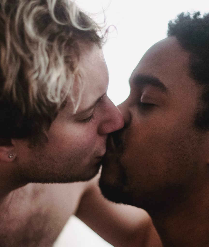 Gay couple kissing